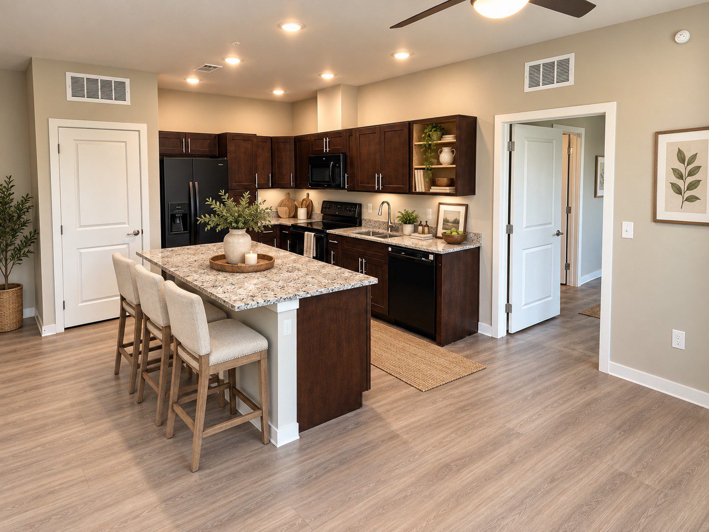 Modern kitchen with wooden cabinets and island.