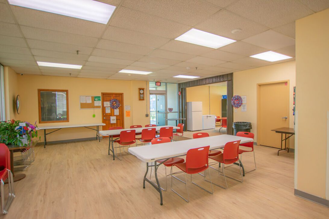 Community room with tables and chairs