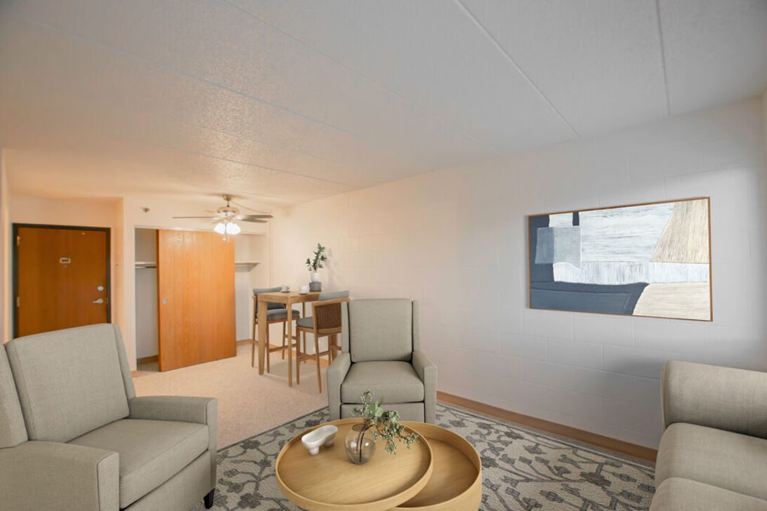 Living room with beige chairs and coffee table