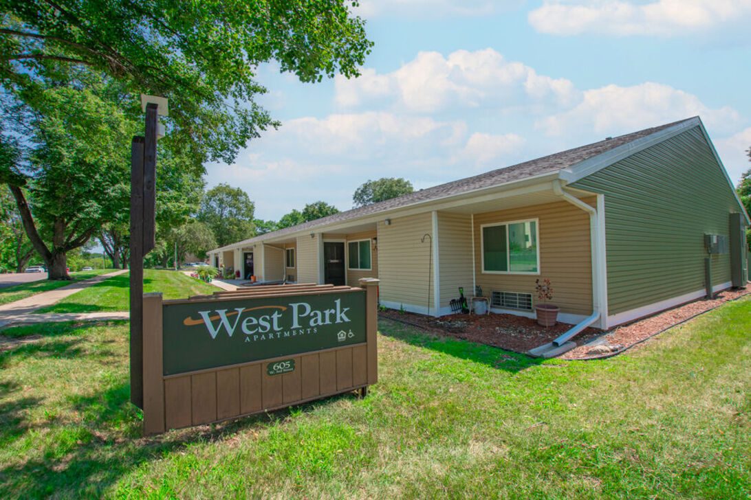 West Park Apartments sign in front of building