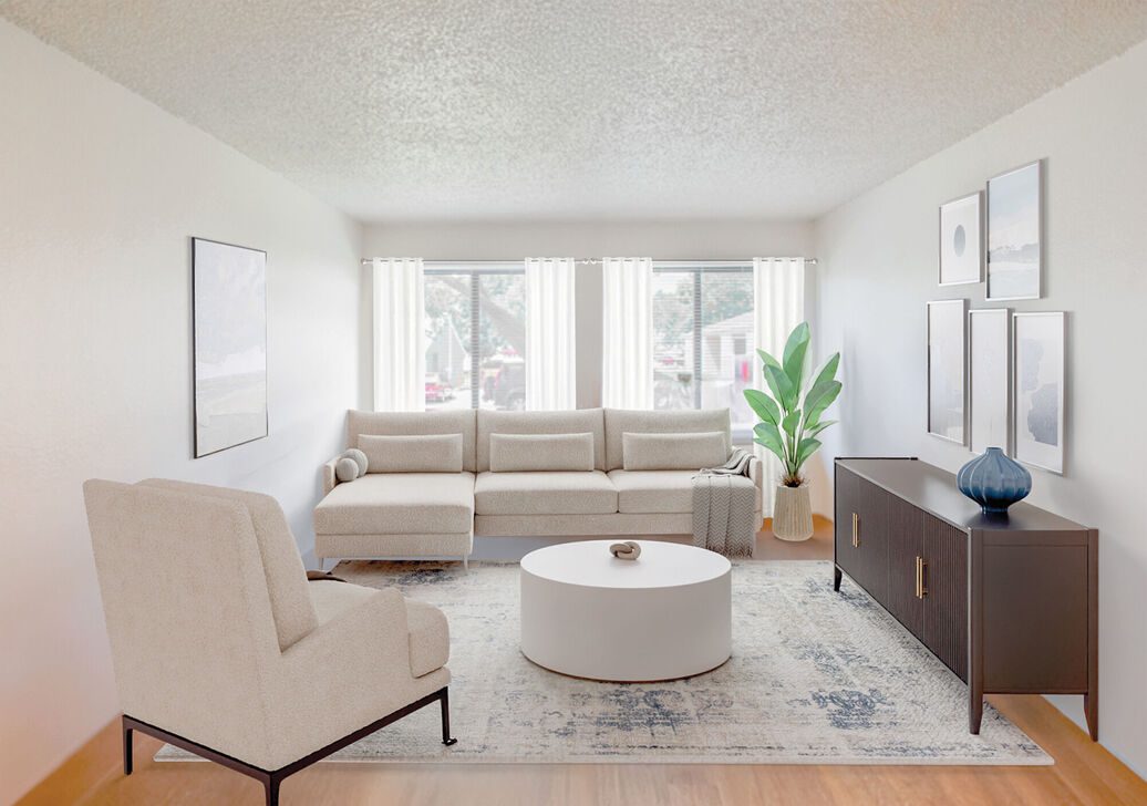 Bright minimalist living room with cream sofa